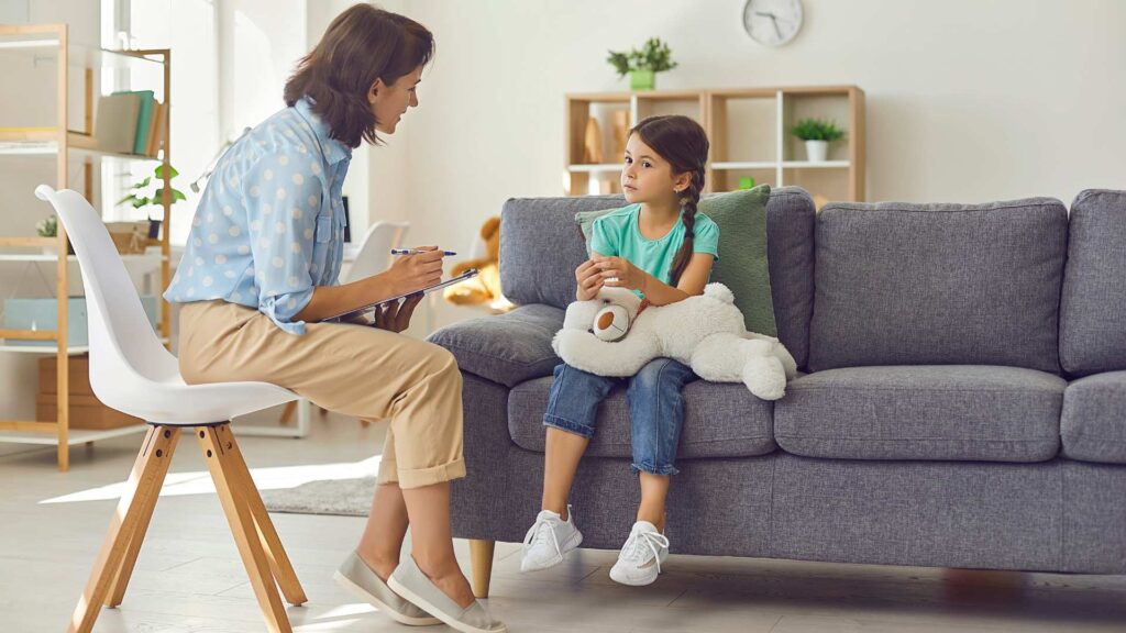 ABA therapist supporting authentic communication to reduce masking in autism