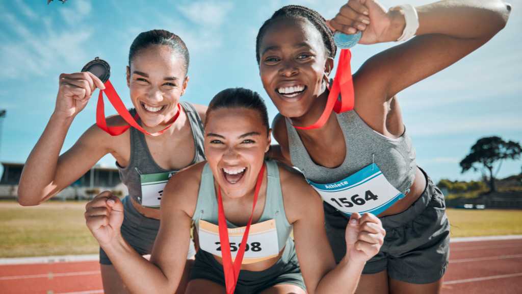 Athletes celebrating victory showing inspiration for athletes with autism in competitive sports